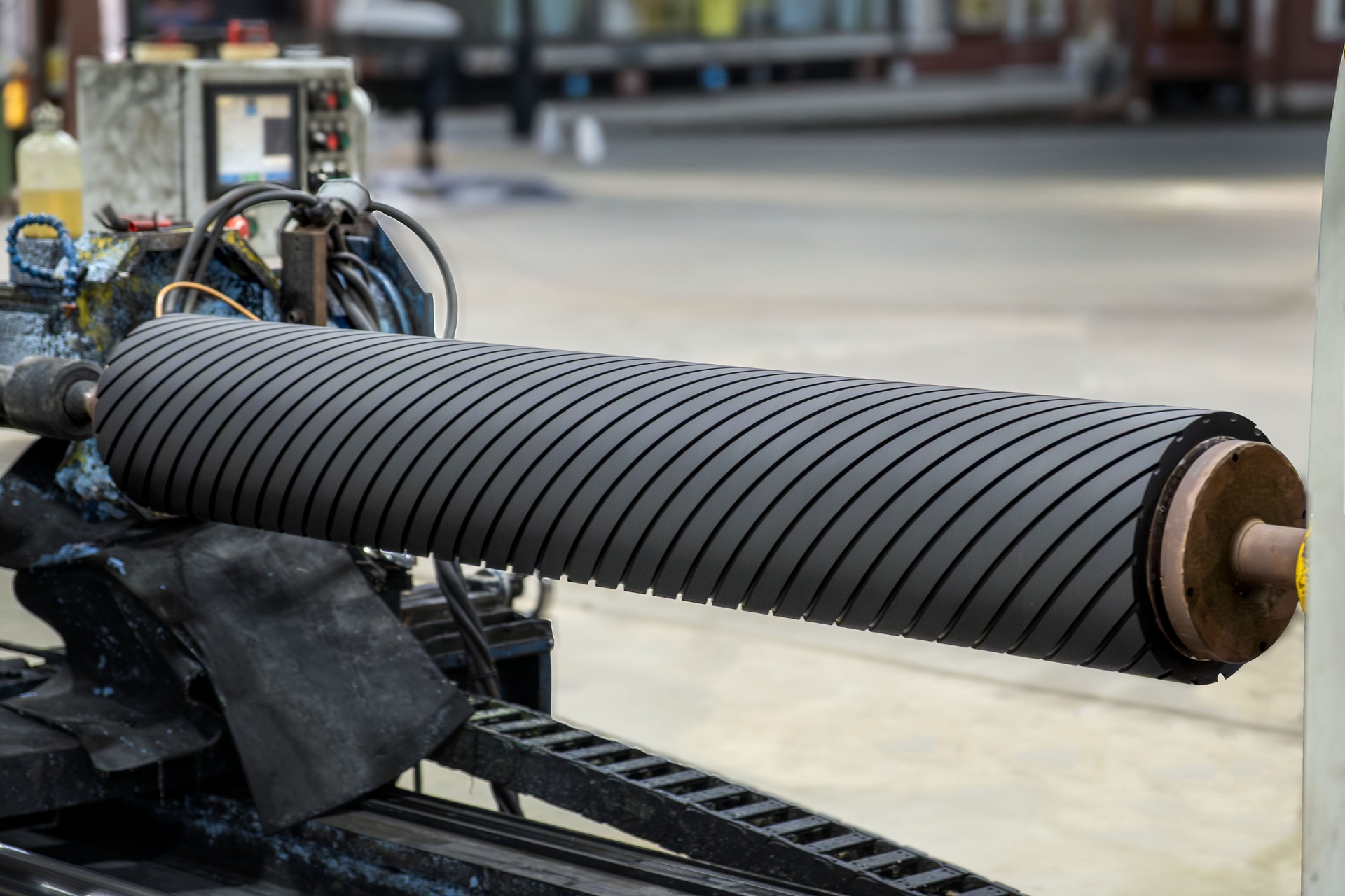 Grooved rubber roll on lathe