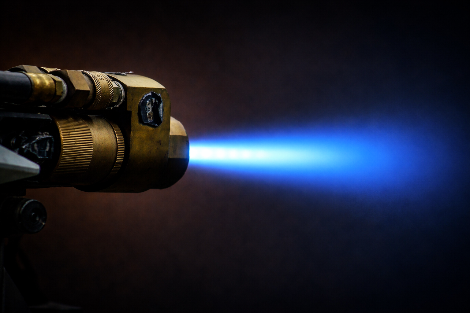 Thermal spray gun in operation